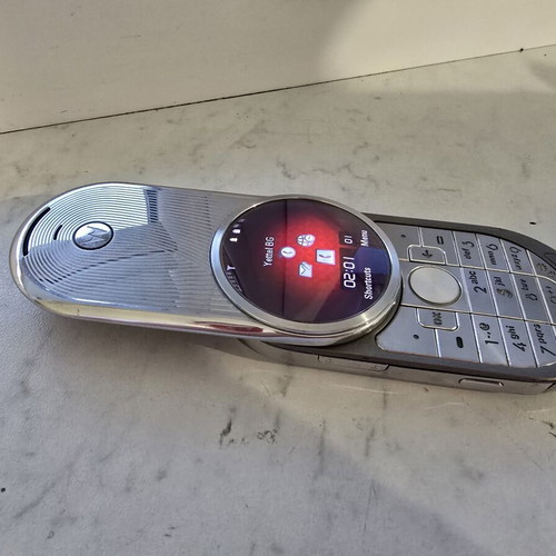 Motorola Aura R1 used, gray phone with smooth mechanism