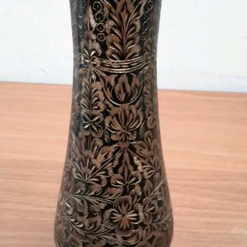 Metal vase with beautiful engraved designs