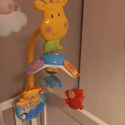 Fisher Price musical rotating mobile used with wind-up mechanism
