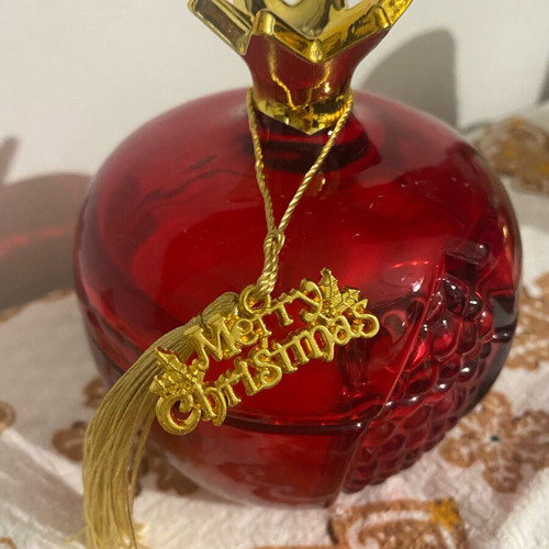 Soy candle new with melomakarono scent in glass pomegranate container