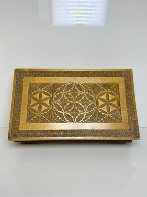 Vintage wooden handmade jewelry box used with carved geometric patterns