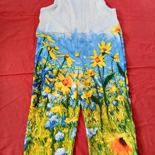 One-piece jumpsuit with straps used, size XL