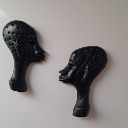African wooden wall heads set of two used, black, hanging