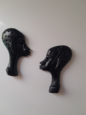 African wooden wall heads set of two used, black, hanging