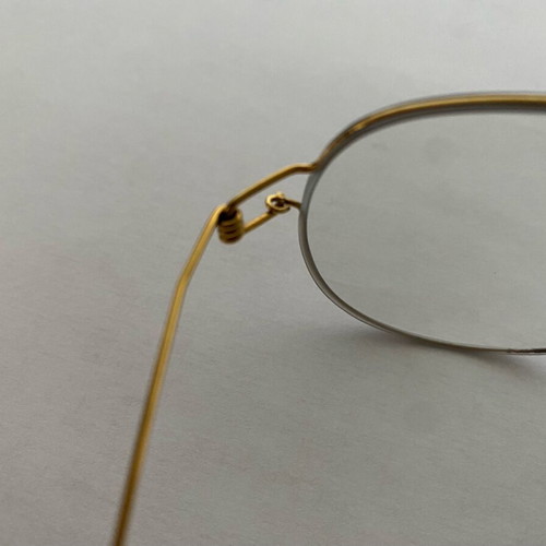Glasses with ultralight titanium frame gold color, like new