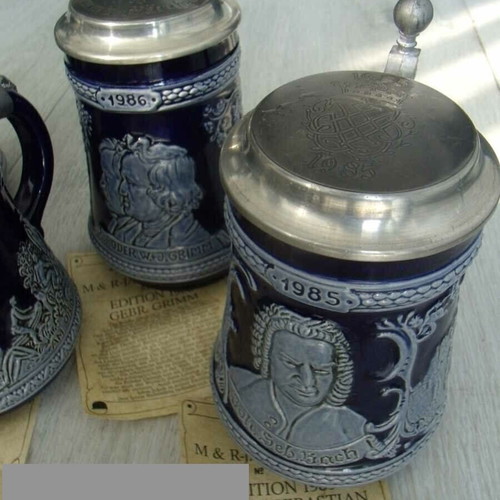 Porcelain steins M & R like new, set of 6 with metal lids