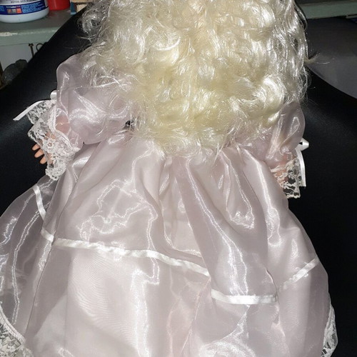 Large bride doll like new with silk clothes