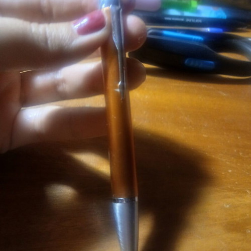 Parker pen like new, orange bronze color