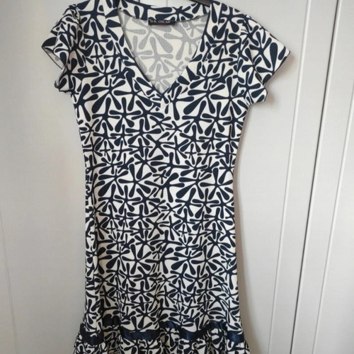 D.X. Oscar mini dress black and white with ruffles and satin detail, like new