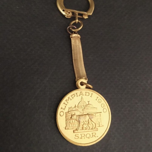 Olympic Games Rome 1960 Keychain like new, metal gold color