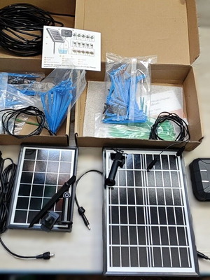 Solar panel set like new, 2 pieces with hoses and drip irrigation