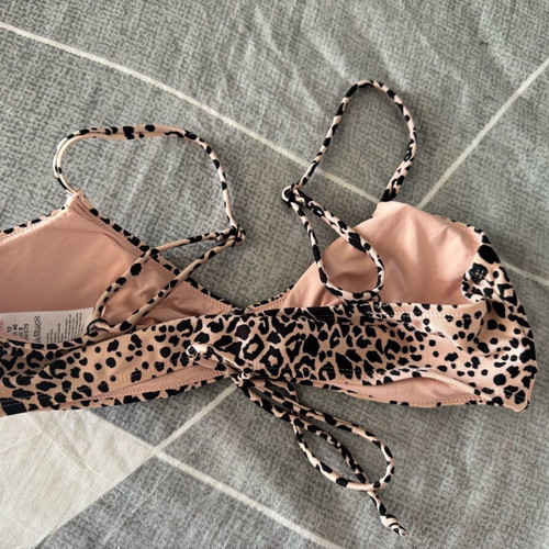 Women's swimsuit top with patterns like new, size 40
