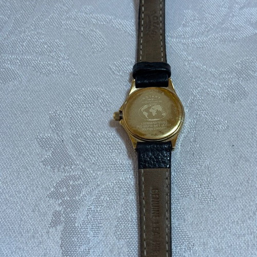 Rotary women's watch gold, like new, classic dial with date