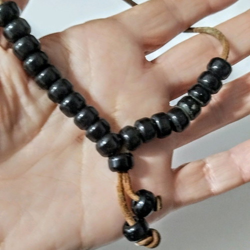 Worry beads like new on thick leather cord vintage