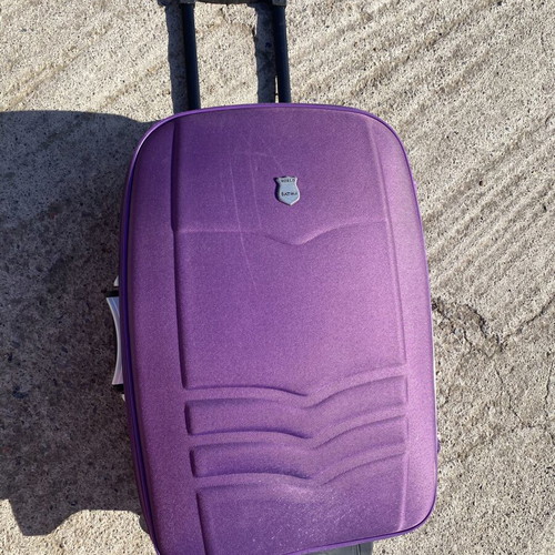 Medium sized luggage purple suitcase used, 2 wheels