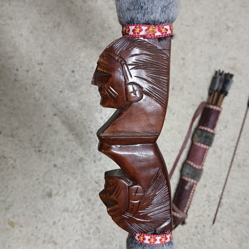 Decorative wooden carved bow with arrows like new