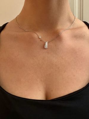 Swarovski κολιέ με φτερό ασημί σαν καινούργιο