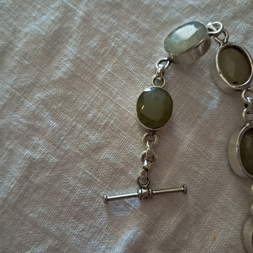 Silver bracelet with genuine green stones, like new