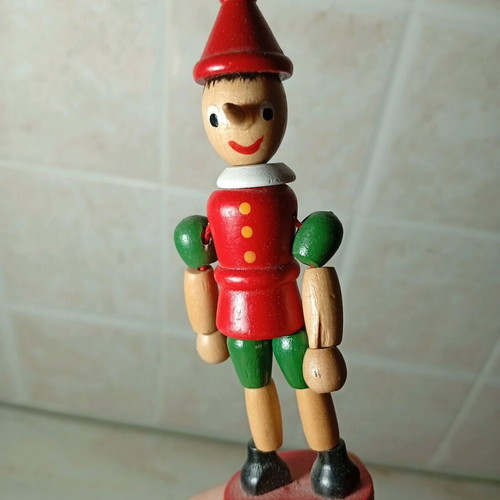 Wooden Pinocchio finger puppet used, classic decorative toy