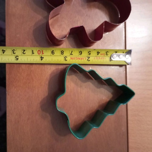 Tupperware cookie cutters like new, set of 3 with tree, boot and little person designs