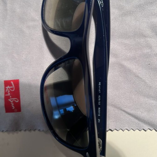 Ray-Ban 4147 sunglasses, blue semi-transparent frame, tinted lenses