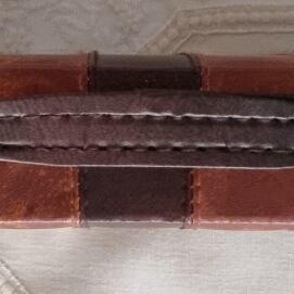 BACKBOARD IN A LEATHER CASE