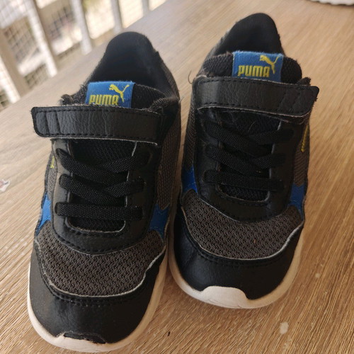 Puma kid shoes size 26 used, black and yellow