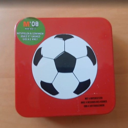 Football coasters in metal box, like new