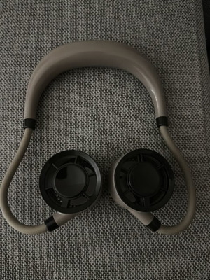 Wireless Neck Fan like new with charger, up to 4 hours battery