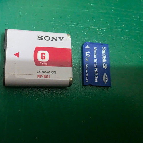 Sony Cyber-shot DSC-W70 digital camera with battery and charger