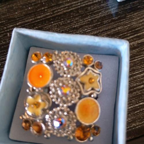 Adjustable ring like new, steel, yellow and orange