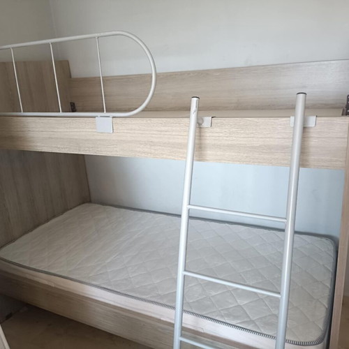 Modeco bunk bed like new, with iron ladder and guardrail