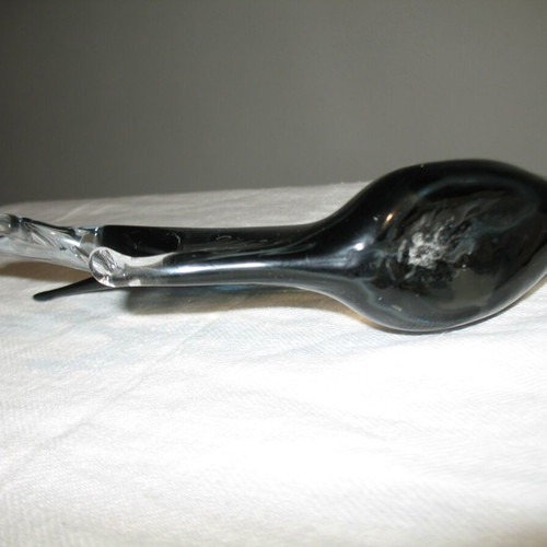 Glass decorative fish used with small tail chip
