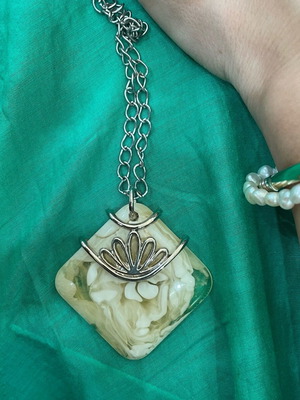 Pendant new with silver chain and unique bone design