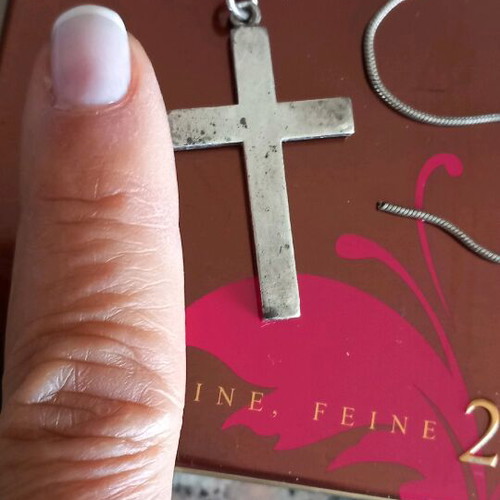 Solid silver cross like new with engraved calligraphic letters