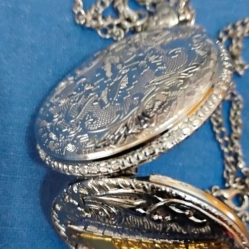 Vintage pocket watch with chain
