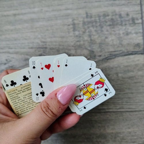 Two playing card decks like new, one small and one large