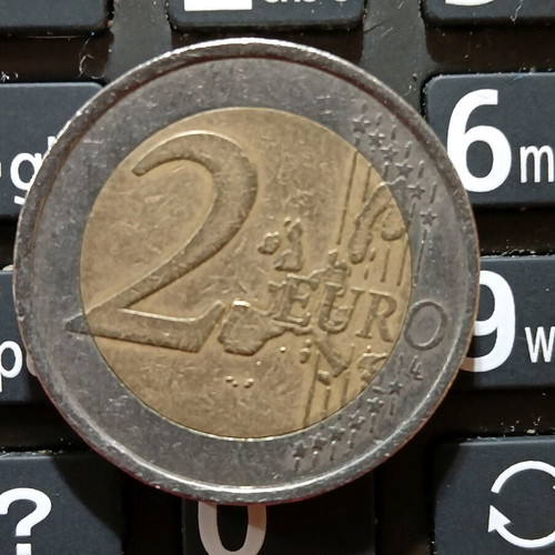 Spanish 2€ coin used 1999 with collectible error