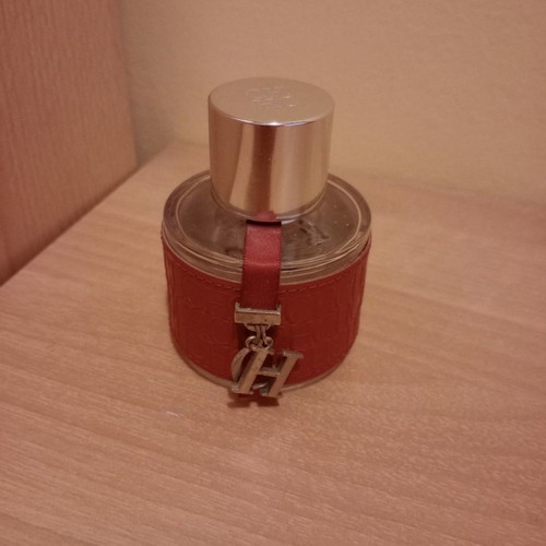 Empty Hugo Boss and Carolina Herrera perfume bottles collectible