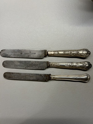 Vintage knives used with silver and silver-plated handles by Christofle and Anowill & Sons Sheffield
