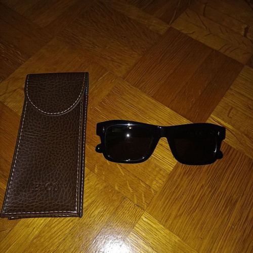 Epos sunglasses new with leather case, black lenses
