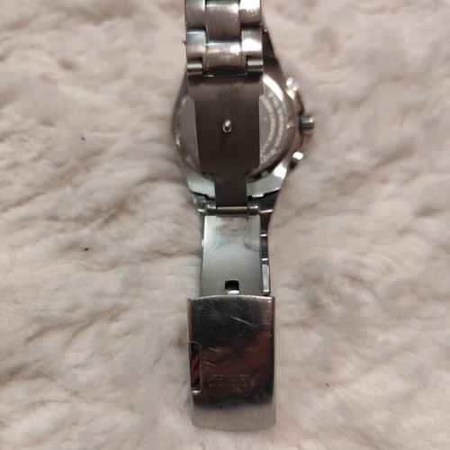 Adidas wristwatch used, silver color