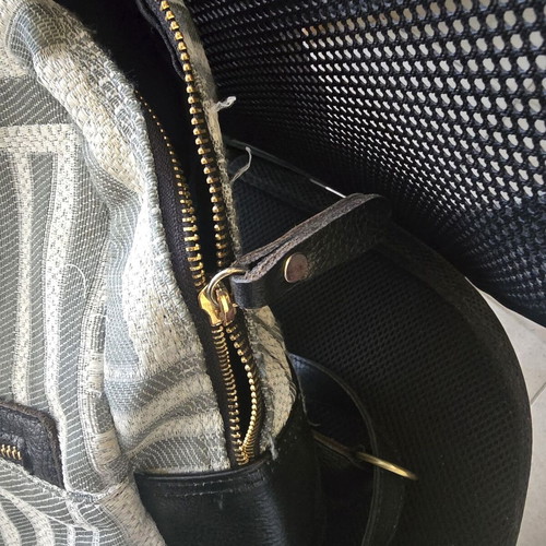 Achilleas Accessories backpack like new, black and gray with zipper repair needed