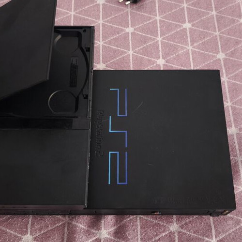 PlayStation 2 (PS2) used with 10 games and memory card