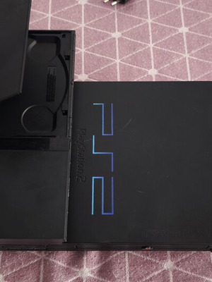 PlayStation 2 (PS2) used with 10 games and memory card