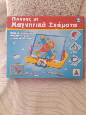 Magnetic shapes board game like new, missing marker