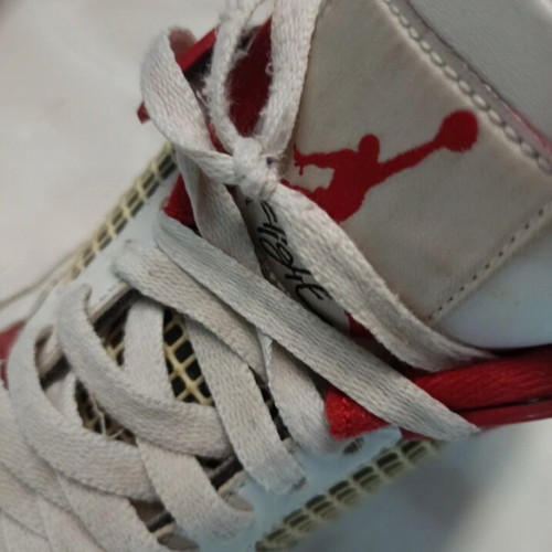 Jordan 4 Fire Red sneakers used, size 41, visible wear