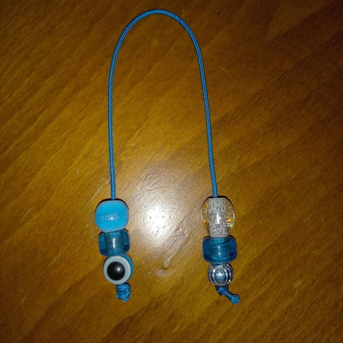 Small blue worry beads with eye stones