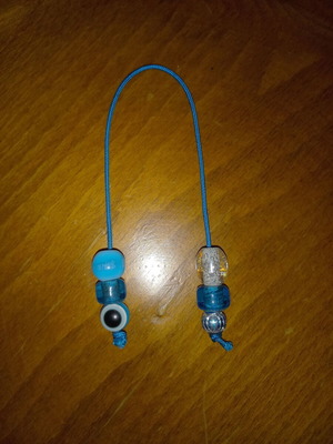 Small blue worry beads with eye stones