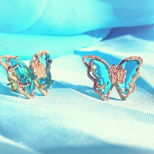 Butterfly stud earrings with blue rhinestones, new